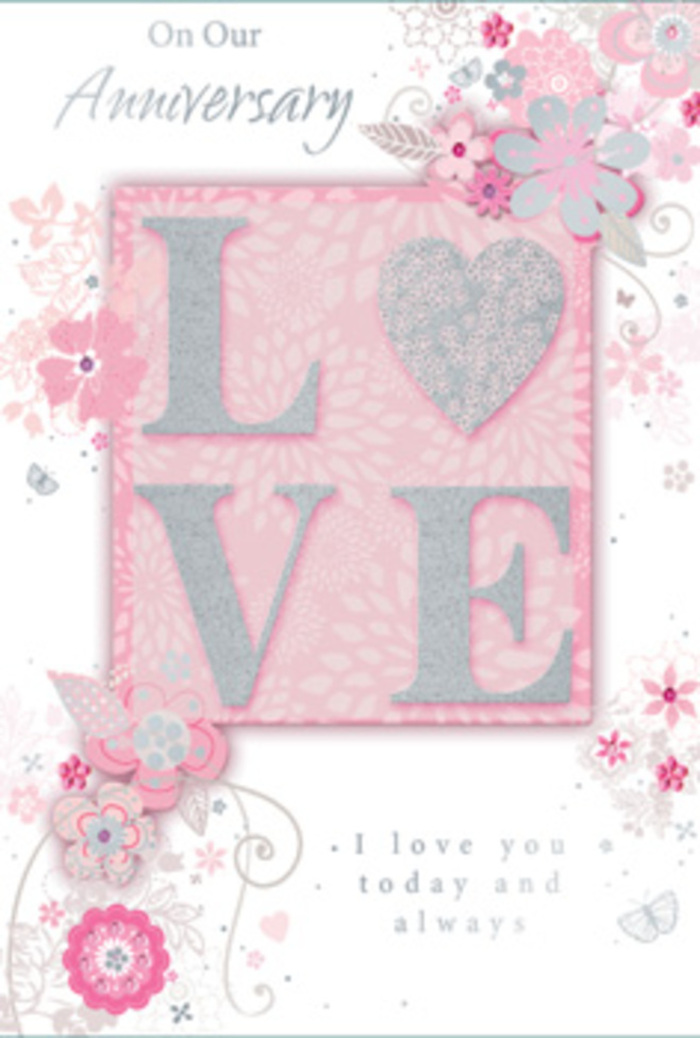 The anniversary card in this image evokes the feeling of stepping into a sun-filled Primrose Hill sitting room, where love is acknowledged in everyday gestures as well as special occasions. The central motif, the word LOVE, stands proudly in raised, frosted-glitter letters that catch the light in a soft, iridescent shimmer, like early morning dew along the paths leading up to the hilltop view. Each letter has a subtle outline, giving it a sculpted, almost three-dimensional presence against a pale blush panel. Around this centrepiece, fine, hand-drawn flowers drift across the card, their petals presented in harmonising tones of pink, lilac, and creamy ivory. The blooms feel weightless, as if carried on a light breeze sweeping over the rooftops near Fitzroy Road, their stems and leaves forming gentle arches and tendrils. Tiny filigree details-slender curls, delicate leaves, and near-hidden butterflies-nestle among the florals, rewarding a closer look the way a well-composed bouquet reveals new stems and textures each time you turn it in your hands. The background remains a calm, soft pink, almost like the blush inside a rose petal, allowing the artwork and lettering to stand out with quiet clarity. In a graceful, understated typeface, the message I love you today and always sits slightly below the main motif, its simplicity adding emotional depth rather than distraction. The overall impression is of a thoughtfully designed keepsake, much like a hand-tied anniversary bouquet curated by a local Primrose Hill florist, radiating gratitude, hope, and the gentle security of long-lasting affection.