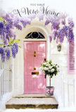 This image presents a sunlit doorway in Primrose Hill that looks as if it has been dressed specially for a new arrival. A pale pink door, with a smooth yet subtly brushed finish, forms the focal point, set into crisp white walls and accompanied by a gently painted shutter that reflects the soft, pastel tones so characteristic of the neighbourhood's prettiest streets. Above, wisteria cascades in generous lavender streams, its clusters of blossoms hanging down in loose, dreamy layers that hint at a gentle perfume drifting across the step like on a spring day near Primrose Hill itself. Just at the threshold, a simple grey metal bucket has been thoughtfully placed, brimming with creamy white roses. The roses are plump and velvety, with petals unfurling in layers, and interwoven with delicate green foliage that adds texture and a whisper of woodland freshness. Around the base of the bucket, a pink satin ribbon is tied in a soft bow, mirroring the hue of the door and weaving the whole composition together. Light falls gently across the scene, tracing the edges of petals and casting mild, elongated shadows that give depth without disturbing the calm atmosphere. The overall feeling is of quiet, heartfelt celebration, as if the flowers have been left there to greet someone stepping into their Primrose Hill home for the very first time-a visual blessing of warmth, welcome, and hopeful new memories waiting to be made just beyond the door.